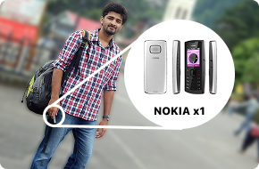 Abhishek as a young student, with a backpack, in a hill town